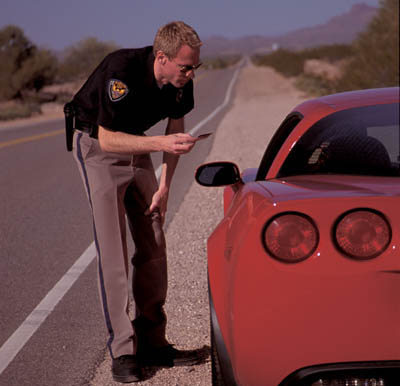 Policeman Using Radar Gun To Detect Speeding Car #2 Metal Print by